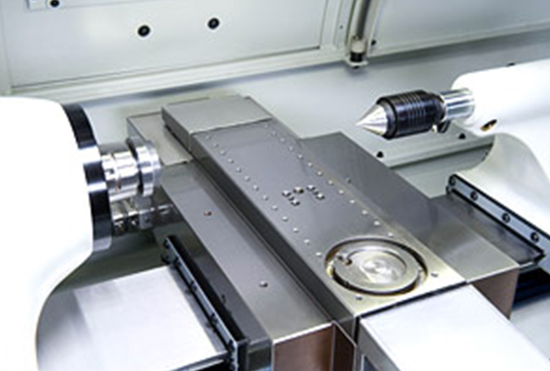 Bare cross slide with precision locator holes for custom applications